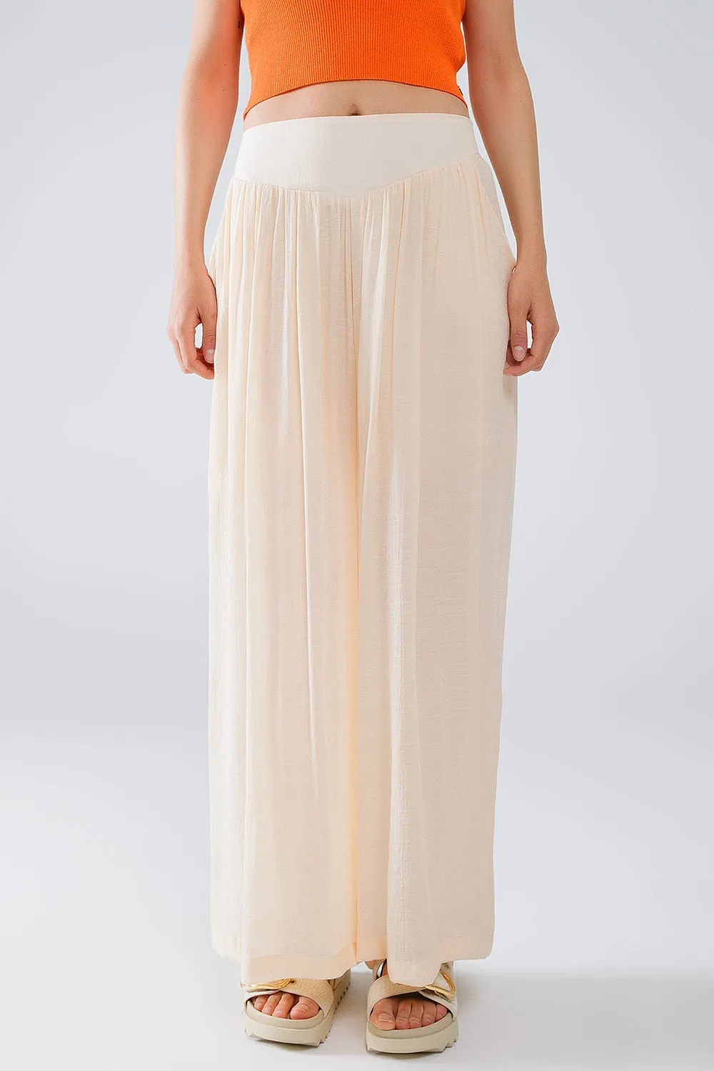 Beige Palazzo style Pants With Side Pockets And Thick Waist Band