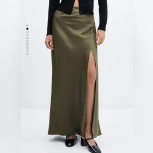 Green satin skirt with side slit. Great condition worn 1x