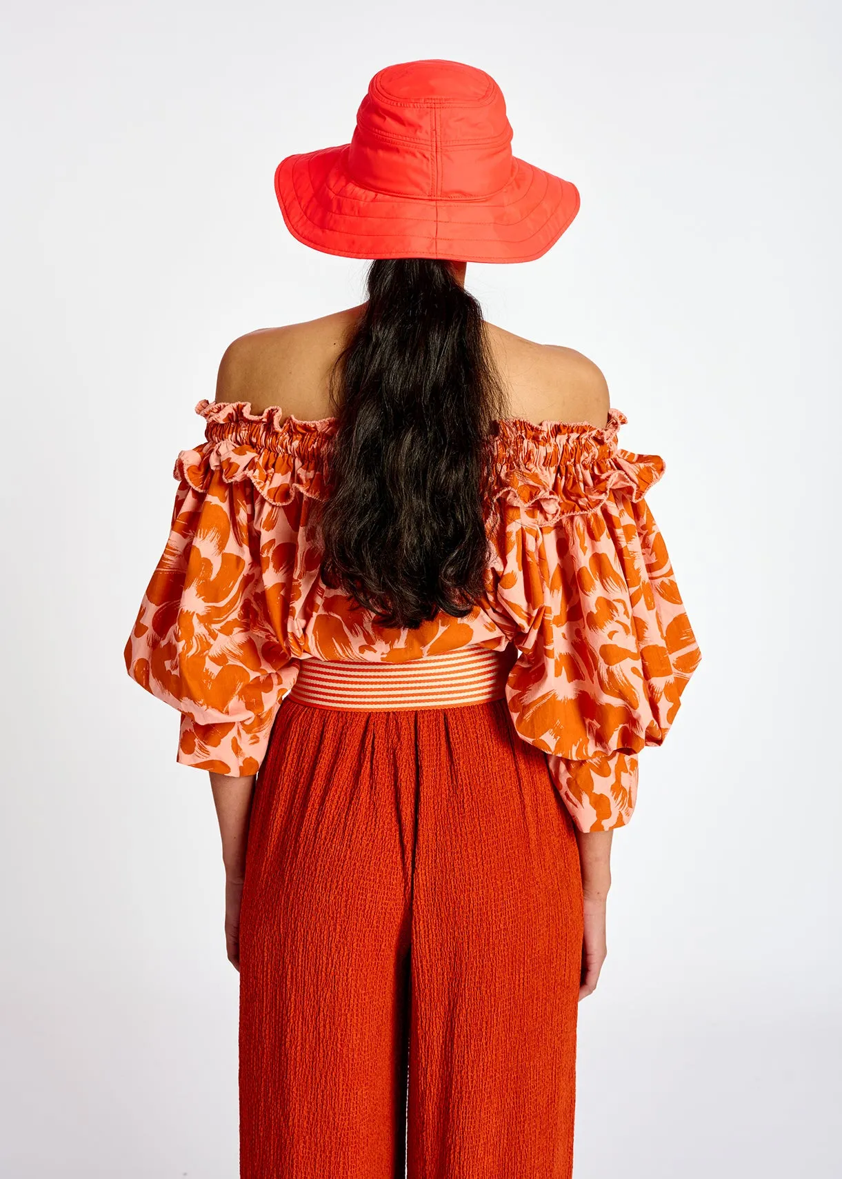 Light pink and orange tropical print off-the-shoulder top